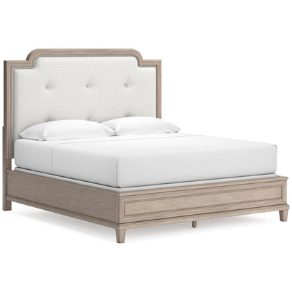 Jorlaina King Upholstered Panel Bed