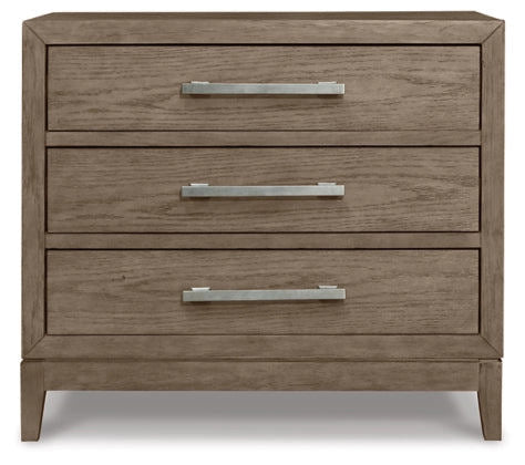 Chrestner Three Drawer Night Stand With Plug
